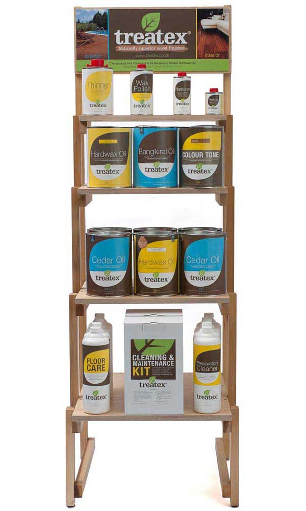 Wooden rack of paint tins showing packaging and logo design by Thame designer  <a href="https://www.treatex.co.uk/">Visit Treatex</a>