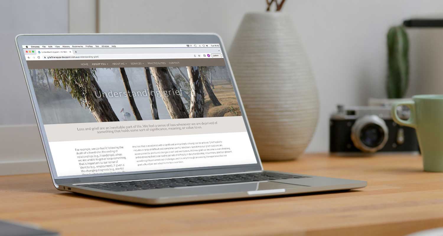 Laptop with home page showing professional website design by Oxford web designer