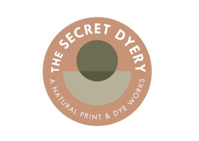 Circular logo used on stickers and swatches for a textiles company and dyery