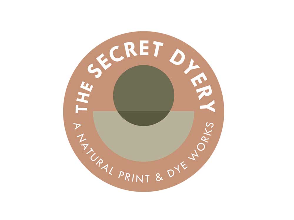 Circular logo used on stickers and swatches for a textiles company and dyery